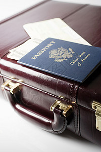 公文包和护照旅行高清图片素材