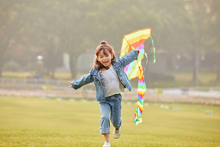 儿童梦想素材小女孩草坪上放风筝背景