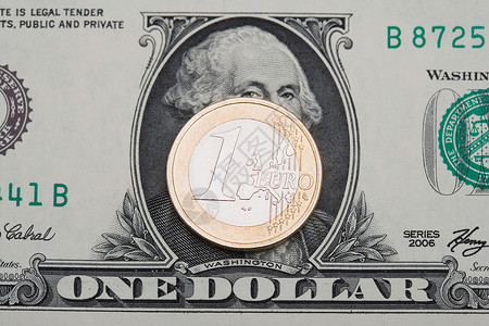 一美元钞票美元钞票和欧元硬币背景