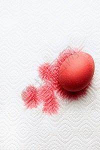 涂上红漆的鸡蛋背景图片
