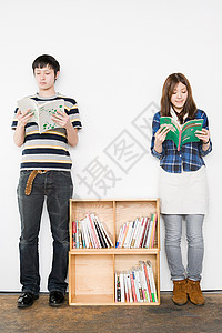 年轻男女读书背景图片