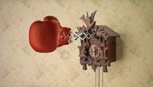 红色拳击手套与布谷鸟钟背景图片