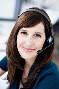 戴耳机的女人肖像客户服务高清图片素材