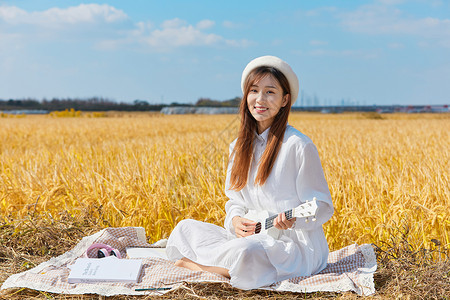 女生弹琴文艺清新女生弹尤克里里背景