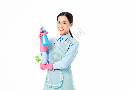 家政服务女性手拿喷壶和长柄清洁刷图片素材