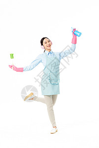 家政服务女性跳跃着清洁玻璃图片