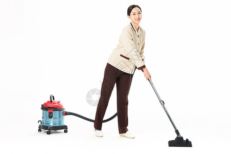 家政服务女性使用吸尘器图片素材