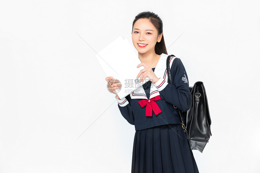 成人教育JK制服美女抱书本图片