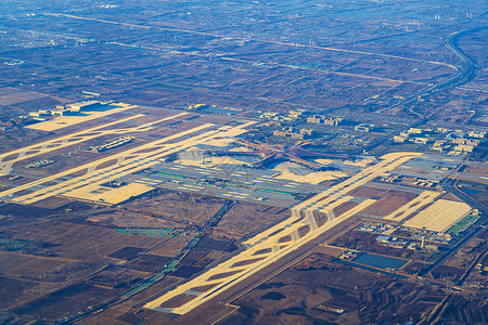 智能航空飞机窗外大兴国际机场背景