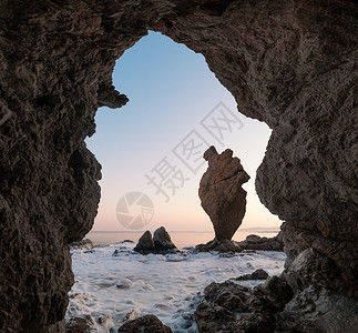 海滩上鹅软石冬天山洞海景风光背景