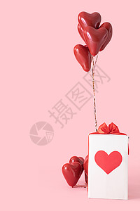 爱心桃气球粉色背景下的情人节礼物盒背景