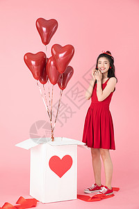 礼物气球爱心情人节拆礼物的女孩背景