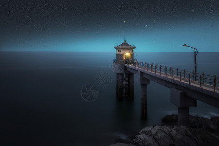 码头夜晚海港星空背景