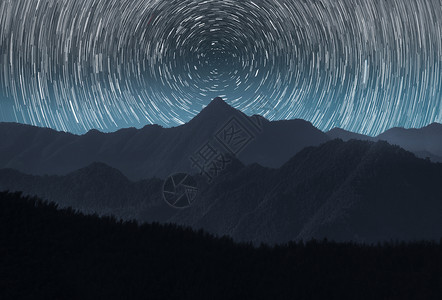 山与星轨背景图片