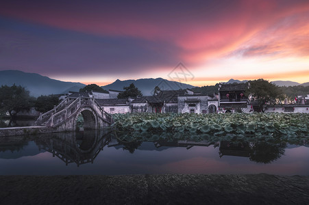 村镇安徽宏村山水晚霞风光背景