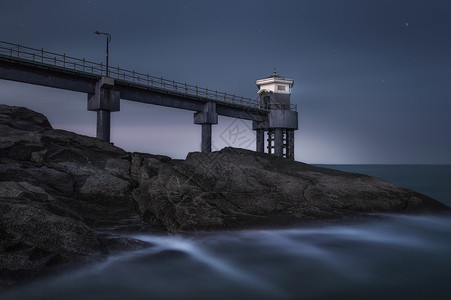 夜下灯塔港湾之夜背景