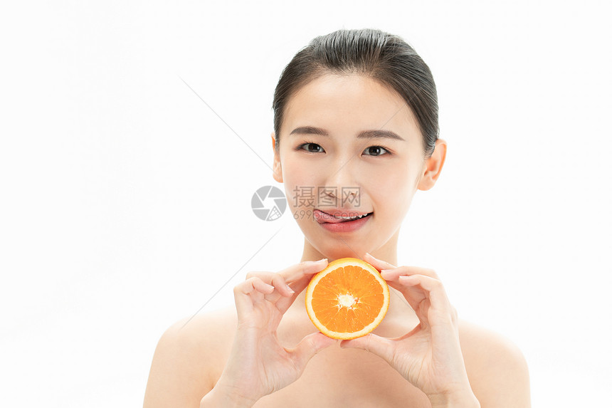 美妆少女与橙子图片