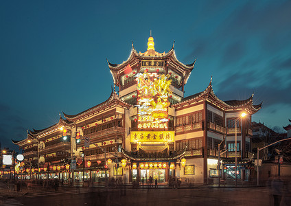 青橙色计分牌夜幕下的上海老城隍庙街景背景