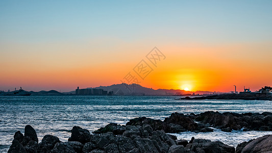 沿海地区山东青岛夕阳背景