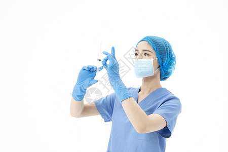 女性医生手术服拿着针筒打针抗疫高清图片素材