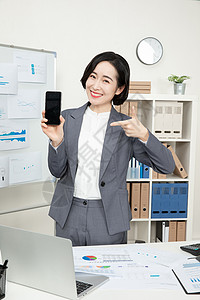 商务女性手机办公图片