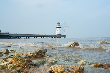 广东珠海海滩边的石头背景图片