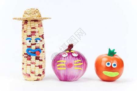 愚人节创意蔬菜玉米洋葱和西红柿高清图片