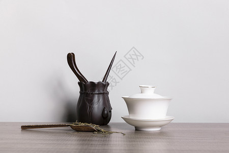 中式茶壶茶具茶叶背景图片