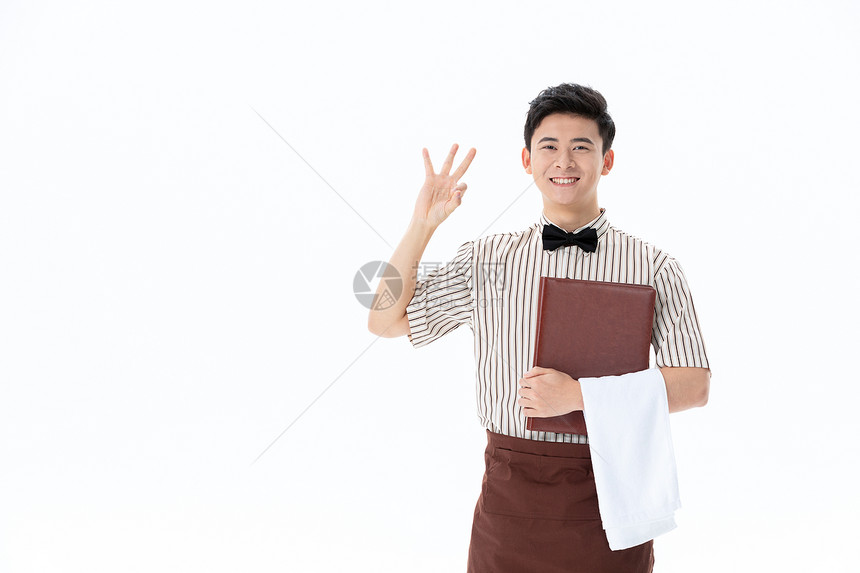 手拿菜单的咖啡店服务员OK手势图片