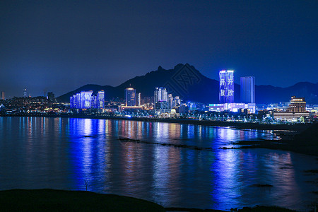 青岛崂山石老人海水浴场灯光秀壮观高清图片素材