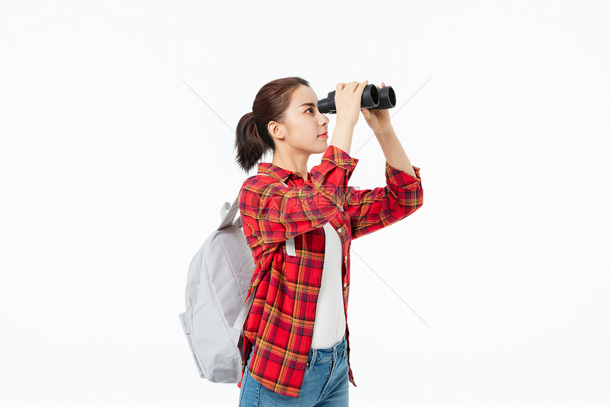 青年女性大学生望远镜找工作图片
