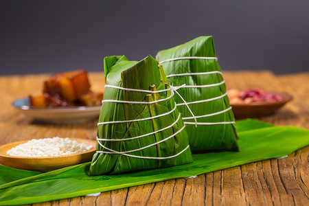 粽情粽义字体端午节粽子端午美食摄影粽子米粽传统美食背景