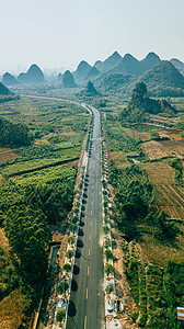 航拍风光公路美丽风景笔直蜿蜒的山景公路图片