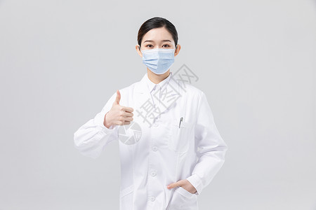 戴着口罩点赞的女医生形象疫情高清图片素材