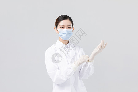 戴手套的女医生形象背景图片