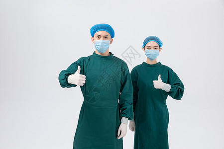 穿手术服思考的外科医生形象穿手术服点赞的双人医生团队形象背景