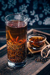 茶叶摄影珍红茶叶泡茶中国风摆设背景图片