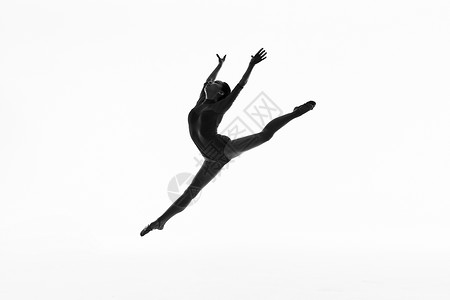 体操运动员年轻美女舞蹈动作黑白剪影背景