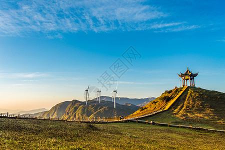 贵州乌蒙大草贵州六盘水乌蒙大草原山顶晴空万里平原上亭子背景