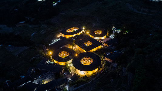 四一愚人节中国福建靖南土楼夜景四菜一汤背景