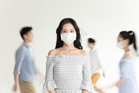 上班路戴口罩防护疫情的年轻女性背景