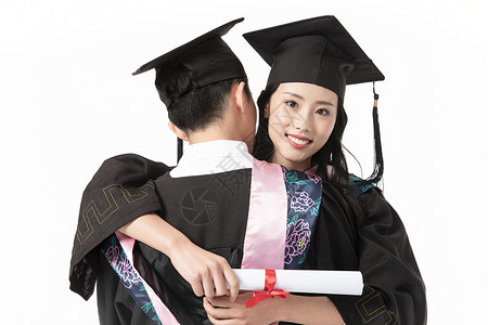 大学毕业生拥抱亚洲人高清图片素材