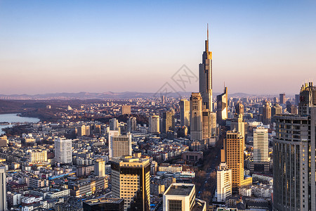 城市南京南京商务区现代建筑夕阳背景