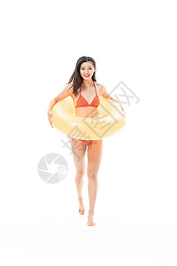 夏日泳装美女拿着游泳圈背景图片