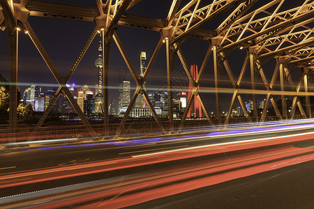 汽车速度感光束上海外滩外白渡桥夜景背景