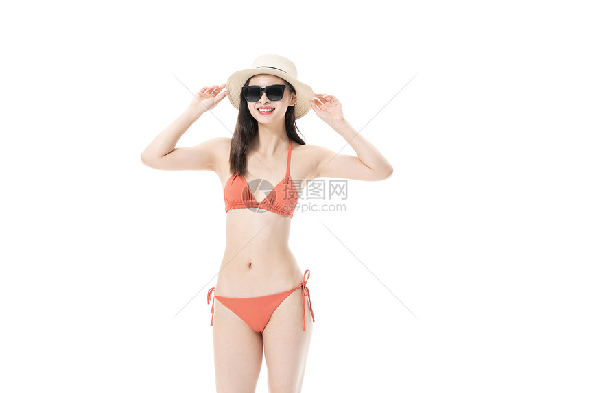 夏日泳装女性戴着墨镜图片