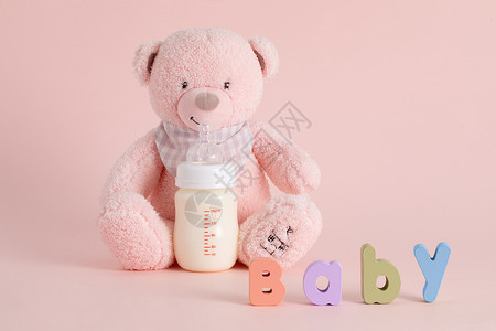 新生儿奶瓶背景图片
