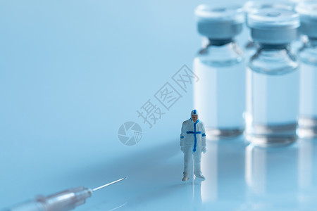 医疗疫苗药品创意小人背景图片