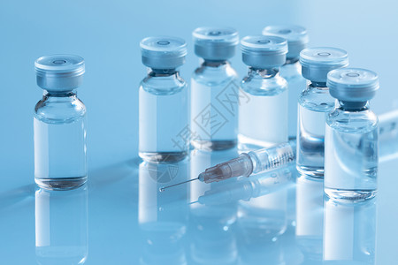手绘针筒医疗疫苗药品针筒背景