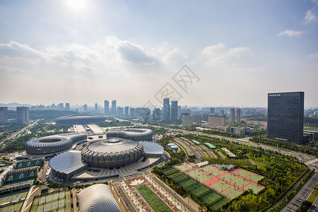 山东济南趵突泉济南奥林匹克体育中心和浪潮大楼背景